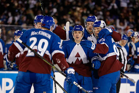 Feb 15, 2020; Colorado Springs, Colorado, USA; Colorado Avalanche defenseman Samuel Girard (49) celebrates with left wing Andre Burakovsky (95) and defenseman Erik Johnson (6) and right wing Mikko Rantanen (96) and center Nathan MacKinnon (29) after his goal in the second period against the Los Angeles Kings during a Stadium Series hockey game at U.S. Air Force Academy Falcon Stadium. Mandatory Credit: Isaiah J. Downing-USA TODAY Sports