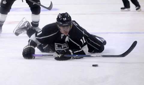 Oct 31, 2015; Los Angeles, CA, USA; Los Angeles Kings center Anze Kopitar (11) dives after the puck in the second period of the game against the Nashville Predators at Staples Center. Mandatory Credit: Jayne Kamin-Oncea-USA TODAY Sports