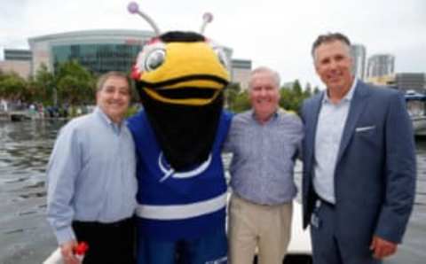 TAMPA, FL – JUNE 06: (L-R) Jeff Vinik, chairman and governor of the Tampa Bay Lightning, mascot ThunderBug, Tampa Bay Mayor Bob Buckhorn, and former player Dave Andreychuk pose for a photo as blue dye is put into the Garrison Channel prior to Game Two of the 2015 NHL Stanley Cup Final between the Tampa Bay Lightning and the Chicago Blackhawks at Amalie Arena on June 6, 2015 in Tampa, Florida. (Photo by Mike Carlson/Getty Images)