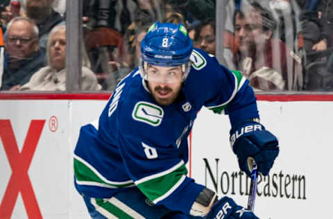 VANCOUVER, BC – MARCH 19: Conor Garland #8 of the Vancouver Canucks skates with the puck during NHL action against the Calgary Flames on March, 19, 2022 at Rogers Arena in Vancouver, British Columbia, Canada. (Photo by Rich Lam/Getty Images)