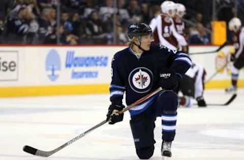 Mar 4, 2017; Winnipeg, Manitoba, CAN; Winnipeg Jets right wing Patrik Laine (29) stretches prior to the game between the Winnipeg Jets and the Colorado Avalanche at the MTS Centre.. Mandatory Credit: Bruce Fedyck-USA TODAY Sports