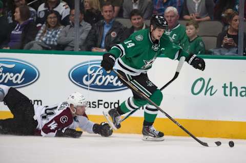 Apr 7, 2016; Dallas, TX, USA; Dallas Stars left wing Jamie Benn (14) steals the puck from Colorado Avalanche left wing Blake Comeau (14) during the third period at the American Airlines Center. The Stars won 4-2. Mandatory Credit: Jerome Miron-USA TODAY Sports