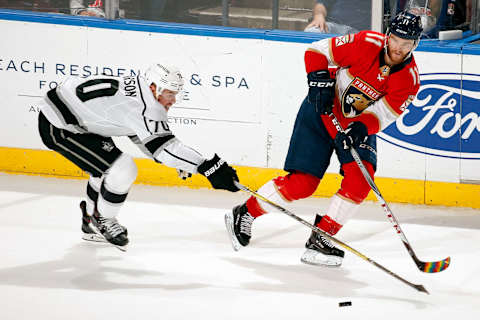 SUNRISE, FL – FEBRUARY 9: Jonathan Huberdeau #11 of the Florida Panthers passes the puck against Tanner Pearson #70 of the Los Angeles Kings at the BB&T Center on February 9, 2018 in Sunrise, Florida. (Photo by Eliot J. Schechter/NHLI via Getty Images)