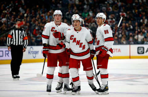 COLUMBUS, OH – OCTOBER 23: Sebastian Aho #20 of the Carolina Hurricanes is congratulated by his teammates after scoring a goal during the game against the Columbus Blue Jackets at Nationwide Arena on October 23, 2021, in Columbus, Ohio. (Photo by Kirk Irwin/Getty Images)