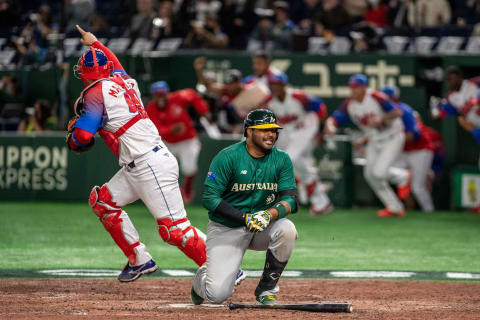 Darryl George reacts in frustration after striking out to end Australia’s WBC in a  4-3 loss to Cuba. (Photo by Philip FONG / AFP) (Photo by PHILIP FONG/AFP via Getty Images)