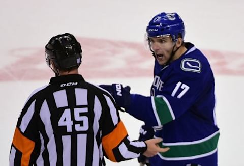 Nov 4, 2015; Vancouver, British Columbia, CAN; Vancouver Canucks forward Radim Vrbata (17) speaks with referee Jon McIsaac (45) during the third period at Rogers Arena. The Vancouver Canucks won 3-2. Mandatory Credit: Anne-Marie Sorvin-USA TODAY Sports