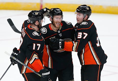 ANAHEIM, CA – FEBRUARY 27: Carter Rowney #24 of the Anaheim Ducks celebrates his second-period goal with Ryan Kesler #17 and Nick Ritchie #37 of the Anaheim Ducks during the game against the Chicago Blackhawks at Honda Center on February 27, 2019 in Anaheim, California. (Photo by Debora Robinson/NHLI via Getty Images)