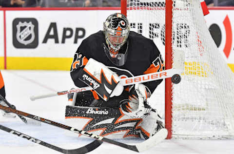 Feb 24, 2023; Philadelphia, Pennsylvania, USA; Philadelphia Flyers goaltender Carter Hart (79) clears the puck to the corner against the Montreal Canadiens during the second period at Wells Fargo Center. Mandatory Credit: Eric Hartline-USA TODAY Sports