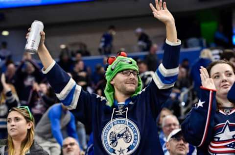 TAMPA, FL – JANUARY 13: A Blue Jackets fan celebrates an empty net goal to secure the victory during the third period of an NHL game between the Tampa Bay Lightning and the Columbus Blue Jackets on January 13, 2017, at Amalie Arena in Tampa, FL. The Blue Jackets defeated the Lightning 3-1 on Martin St. Louis jersey retirement night. (Photo by Roy K. Miller/Icon Sportswire via Getty Images)