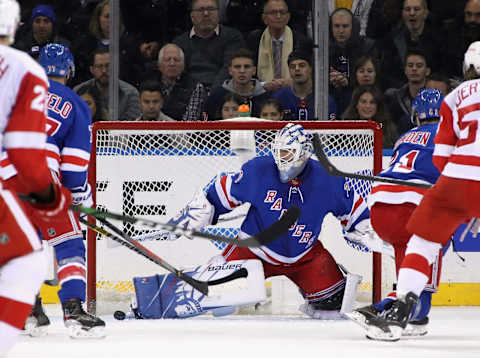 NEW YORK, NEW YORK – NOVEMBER 06: Henrik Lundqvist #30 of the New York Rangers makes the second period save against the Detroit Red Wings at Madison Square Garden on November 06, 2019 in New York City. The Rangers defeated the Red Wings 5-1. (Photo by Bruce Bennett/Getty Images)