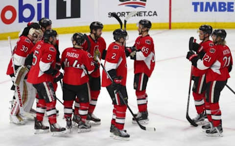 Mar 19, 2016; Ottawa, Ontario, CAN; Ottawa Senators players celebrate their win against the Montreal Canadiens at Canadian Tire Centre. Mandatory Credit: Jean-Yves Ahern-USA TODAY Sports