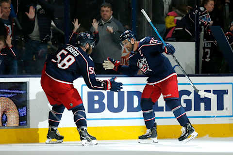 COLUMBUS, OH – FEBRUARY 24: David Savard #58 of the Columbus Blue Jackets and Nick Foligno #71 celebrate after defeating the Ottawa Senators in overtime on February 24, 2020 at Nationwide Arena in Columbus, Ohio. Columbus defeated Ottawa 4-3 in overtime. (Photo by Kirk Irwin/Getty Images)