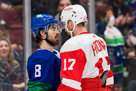 Mar 17, 2022; Vancouver, British Columbia, CAN; Vancouver Canucks forward Conor Garland (8) and Detroit Red Wings defenseman Filip Hronek (17) share words during a stop in play in the third period at Rogers Arena. Detroit won 1-0. Mandatory Credit: Bob Frid-USA TODAY Sports