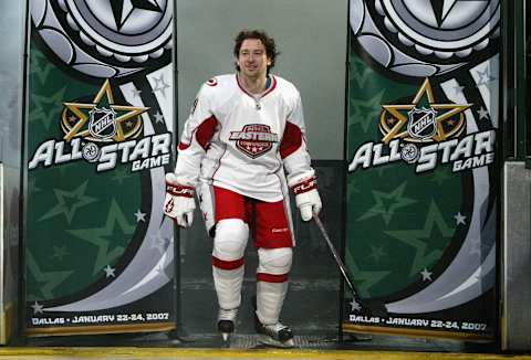 DALLAS – JANUARY 24: Eastern Conference All-Star Justin Williams #11 of the Carolina Hurricanes skates out onto the ice during introductions to the 2007 NHL All-Star Game at the American Airlines Center on January 24, 2007 in Dallas, Texas. The West defeated the East 12-9. (Photo by Dave Sandford/Getty Images for NHL)