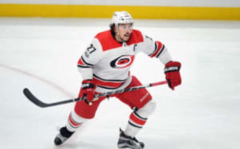 ANAHEIM, CA – DECEMBER 11: Carolina Hurricanes captain Justin Faulk (27) in action during the third period of a game against the Anaheim Ducks, on December 11, 2017, played at the Honda Center in Anaheim, CA. (Photo by John Cordes/Icon Sportswire via Getty Images)