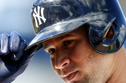 Feb 24, 2017; Tampa, FL, USA; New York Yankees catcher Gary Sanchez (24) walks off the field after hitting a pop fly in the fifth inning of a baseball game against the Philadelphia Phillies during spring training at George M. Steinbrenner Field. Mandatory Credit: Butch Dill-USA TODAY Sports. MLB.