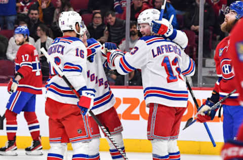 MONTREAL, CANADA – MARCH 09: Alexis Lafrenière #13 of the New York Rangers celebrates his goal with teammate Vincent Trocheck #16 during the first period against the Montreal Canadiens at Centre Bell on March 9, 2023, in Montreal, Quebec, Canada. Photo by Minas Panagiotakis/Getty Images)