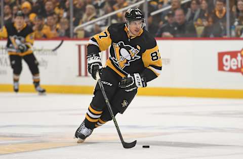 PITTSBURGH, PA – MAY 07: Sidney Crosby #87 of the Pittsburgh Penguins skates with the puck against the New York Rangers during the second period in Game Three of the First Round of the 2022 Stanley Cup Playoffs at PPG PAINTS Arena on May 7, 2022 in Pittsburgh, Pennsylvania. (Photo by Justin Berl/Getty Images)