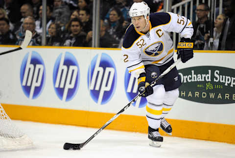 SAN JOSE, CA – JANUARY 06: Craig Rivet #52 of the Buffalo Sabres skates with the puck against the San Jose Sharks during an NHL hockey game at the HP Pavilion on January 6, 2011 in San Jose, California. The Sabres won the game 3-0. (Photo by Thearon W. Henderson/Getty Images)