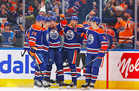 Nov 15, 2023; Edmonton, Alberta, CAN; The Edmonton Oilers celebrate a goal scored by forward Connor McDavid (97) during the second period against the Seattle Kraken at Rogers Place. Mandatory Credit: Perry Nelson-USA TODAY Sports