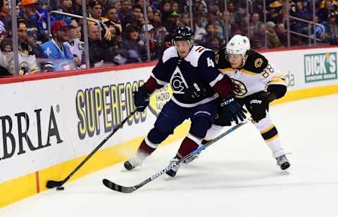 Nov 13, 2016; Denver, CO, USA; Boston Bruins right wing David Pastrnak (88) and Colorado Avalanche defenseman Tyson Barrie (4) in the first period at Pepsi Center. Mandatory Credit: Ron Chenoy-USA TODAY Sports