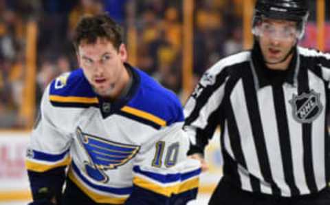 St. Louis Blues right wing Scottie Upshall (10) is escorted off the ice after a penalty (Christopher Hanewinckel-USA TODAY Sports)