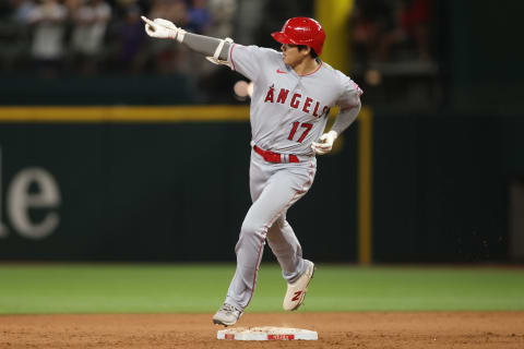 ARLINGTON, TEXAS – JUNE 12: Shohei Ohtani #17 of the Los Angeles Angels reacts as he rounds the bases after hitting a two-run home run in the twelfth inning against the Texas Rangers at Globe Life Field on June 12, 2023 in Arlington, Texas. (Photo by Tim Heitman/Getty Images)