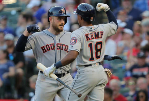 The Houston Astros’ Max Stassi celebrates a solo home run in the fifth inning with teammate Tony Kemp (18) against the Texas Rangers at Globe Life Park in Arlington, Texas, on Saturday, June 9, 2018. The Astros won, 4-3. (Rodger Mallison/Fort Worth Star-Telegram/TNS via Getty Images)