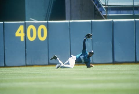 Ken Griffey Jr. in action with the Seattle Mariners. Otto Greule Jr. /Allsport