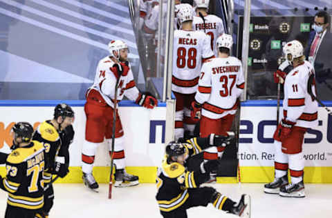 The Carolina Hurricanes leave the ice following a 4-3 double-overtime loss to the Boston Bruins(Photo by Elsa/Getty Images)