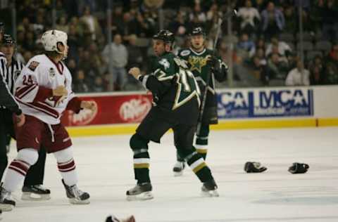 DALLAS – JANUARY 9: Matthew Barnaby #77 of the Dallas Stars fights against Josh Gratton #24 of the Phoenix Coyotes on January 9, 2007 at the American Airlines Center in Dallas, Texas. The Coyotes won 5-2. (Photo by Ronald Martinez/Getty Images)