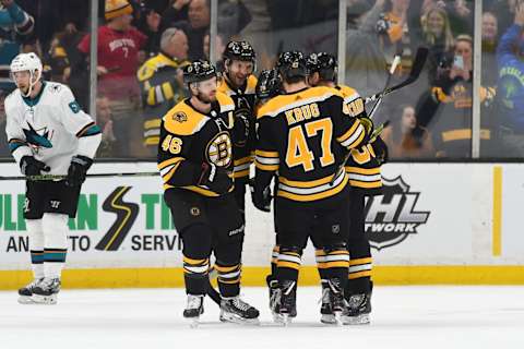 BOSTON, MA – FEBRUARY 26: Patrice Bergeron #37 of the Boston Bruins smiles and celebrates with his line mates a goal against the San Jose Sharks at the TD Garden on February 26, 2019 in Boston, Massachusetts. (Photo by Steve Babineau/NHLI via Getty Images)