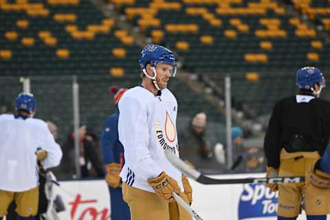 Oct 28, 2023; Edmonton, Alberta, Canada; Edmonton Oilers centre Connor McDavid (97) hits the ice during practice day for the 2023 Heritage Classic ice hockey game at Commonwealth Stadium. Mandatory Credit: Walter Tychnowicz-USA TODAY Sports