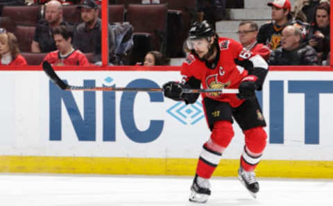 OTTAWA, ON – MARCH 9: Erik Karlsson #65 of the Ottawa Senators passes the puck against the Calgary Flames at Canadian Tire Centre on March 9, 2018 in Ottawa, Ontario, Canada. (Photo by Jana Chytilova/Freestyle Photography/Getty Images) *** Local Caption ***