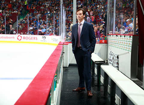 VANCOUVER, BC – OCTOBER 11: Head coach Dallas Eakins of the Edmonton Oilers looks on from the bench during their NHL game against the Vancouver Canucks at Rogers Arena October 11, 2014, in Vancouver, British Columbia, Canada. Vancouver won 5-4 in a shootout. (Photo by Jeff Vinnick/NHLI via Getty Images)