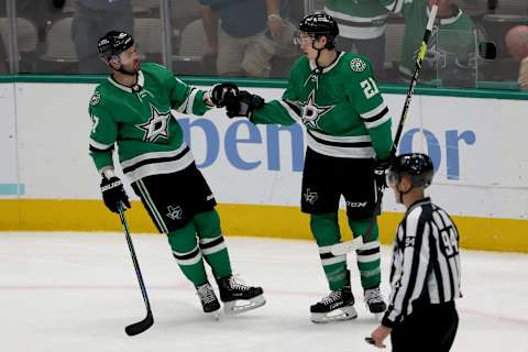 DALLAS, TEXAS – APRIL 29: Jason Robertson #21 of the Dallas Stars celebrates with Alexander Radulov #47 of the Dallas Stars after scoring against the Anaheim Ducks in the third period at American Airlines Center on April 29, 2022 in Dallas, Texas. (Photo by Tom Pennington/Getty Images)