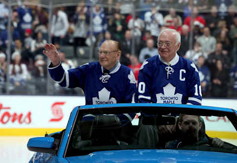 TORONTO, CANADA – FEBRUARY 16: 1963 Stanley Cup Champions Johnny Bower and George Armstrong take to the ice during a ceremony commemorating the 50th anniversary of the team before NHL action at the Air Canada Centre February 16, 2013 in Toronto, Ontario, Canada. (Photo by Abelimages/Getty Images)