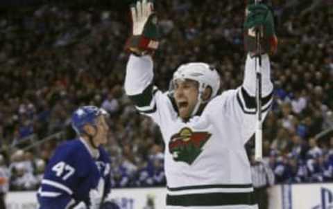 Dec 7, 2016; Toronto, Ontario, CAN; Minnesota Wild forward Jason Zucker (16) celebrates his goal against the Toronto Maple Leafs during the first period at Air Canada Centre. Mandatory Credit: John E. Sokolowski-USA TODAY Sports