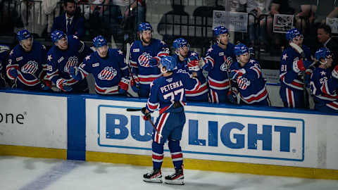 JJ Peterka (77) celebrates his goal against the Utica Comets during the 2022 Calder Cup Playoffs on Saturday, May 14, 2022 at the Adirondack Bank Center in Utica. Peterka would go on to complete his hat-trick to win the game in overtime. The series is now tied 1-1.Peterka Utica Comets Vs Rochester Americans