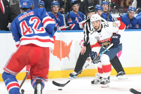 NEW YORK, NY – OCTOBER 23: Vincent Trocheck #21 of the Florida Panthers skates with the puck against Brendan Smith #42 of the New York Rangers at Madison Square Garden on October 23, 2018 in New York City. The New York Rangers won 5-2. (Photo by Jared Silber/NHLI via Getty Images)