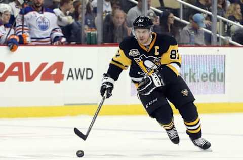 Nov 8, 2016; Pittsburgh, PA, USA; Pittsburgh Penguins center Sidney Crosby (87) chases the puck against the Edmonton Oilers during the second period at the PPG Paints Arena. Mandatory Credit: Charles LeClaire-USA TODAY Sports