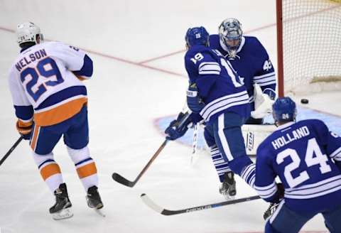 Dec 29, 2015; Toronto, Ontario, CAN; New York Islanders left wing Brock Nelson (29) scores past Toronto Maple Leafs left wing Joffrey Lupul (19) and goalie Jonathan Bernier (45) in the first period at Air Canada Centre. Mandatory Credit: Dan Hamilton-USA TODAY Sports