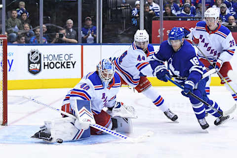 TORONTO, ON – MARCH 23: New York Rangers Goalie Alexandar Georgiev (40) makes a save on Toronto Maple Leafs Left Wing Andreas Johnsson (18) during the regular season NHL game between the New York Rangers and Toronto Maple Leafs on March 23, 2019 at Scotiabank Arena in Toronto, ON. (Photo by Gerry Angus/Icon Sportswire via Getty Images)