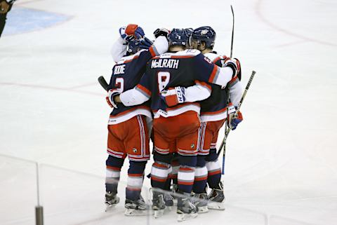 May 21, 2015: Hartford celebrates the goal from Hartford Wolf Pack Defenseman Mat Bodie (2). The Manchester Monarchs defeated the Hartford Wolf Pack 3-2 in Game 1 of the Eastern Conference Finals of the 2015 AHL Calder Cup playoffs at Verizon Wireless Arena in Manchester, NH. (Photo by Fred Kfoury III/Icon Sportswire/Corbis via Getty Images)