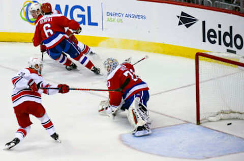 WASHINGTON, DC – DECEMBER 27: Washington Capitals goaltender Braden Holtby (70) gives up a third period goal on a rebound to Carolina Hurricanes center Sebastian Aho (20) on December 27, 2018, at the Capital One Arena in Washington, D.C. (Photo by Mark Goldman/Icon Sportswire via Getty Images)