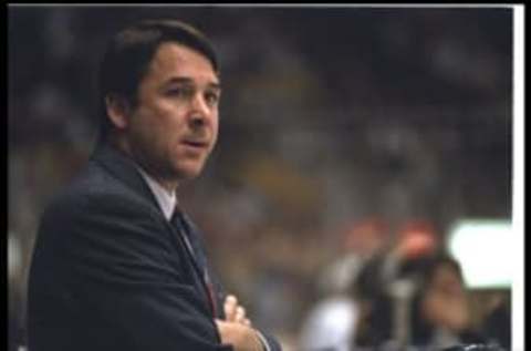 INGLEWOOD, CA – NOVEMBER 16: Head coach Mike Milbury of the New York Islanders looks on during a game against the Los Angeles Kings on November 16, 1995, at the Great Western Forum in Inglewood, California. The Kings won the game, 9-2. (Photo by Glenn Cratty/Getty Images)