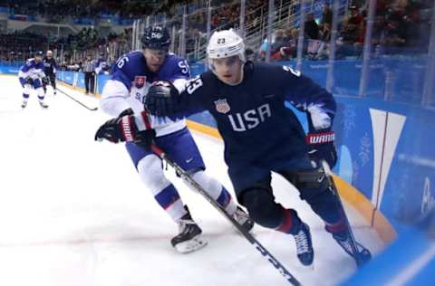 GANGNEUNG, SOUTH KOREA: Troy Terry #23 of the United States skates against Michal Cajkovsky #56 of Slovakia during the PyeongChang 2018 Winter Olympic Games on February 20, 2018.. (Photo by Bruce Bennett/Getty Images)