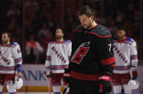 RALEIGH, NORTH CAROLINA – MAY 18: Brendan Smith #7 of the Carolina Hurricanes prepares to skate against the New York Rangers in Game One of the Second Round of the 2022 Stanley Cup Playoffs at PNC Arena on May 18, 2022, in Raleigh, North Carolina. The Hurricane defeated the Rangers 1-0 in overtime. (Photo by Bruce Bennett/Getty Images)