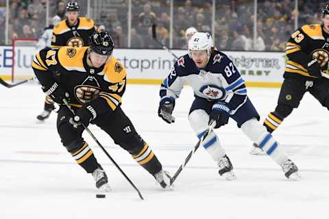 BOSTON, MA – JANUARY 9: Torey Krug #47 of the Boston Bruins skates against Mason Appleton #82 of the Winnipeg Jets at the TD Garden on January 9, 2020 in Boston, Massachusetts. (Photo by Steve Babineau/NHLI via Getty Images)