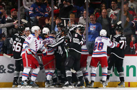 NEWARK, NEW JERSEY – MARCH 30: The New Jersey Devils and the New York Rangers battle at the Prudential Center on March 30, 2023, in Newark, New Jersey. (Photo by Bruce Bennett/Getty Images)